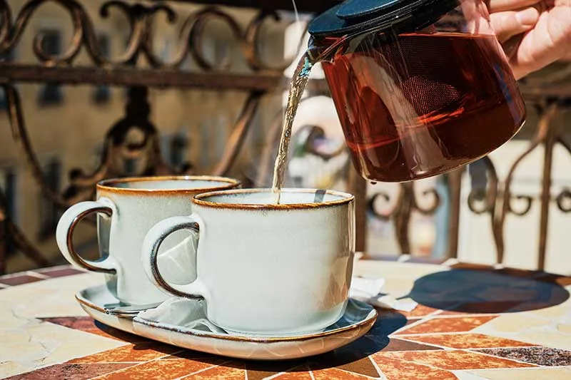 Drinking Hot Tea in the Summer Heat