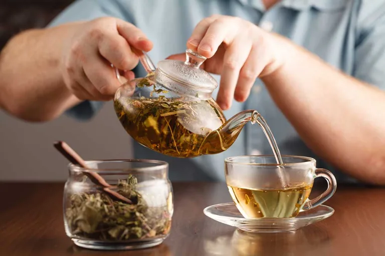 Drinking Hot Tea to Cool Down During Summer